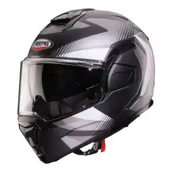 <strong data-end="136" data-start="111">Caberg Trip Lunar Sort Matt/Hvit/Gr&aring;</strong> er en innovativ flip-back MC-hjelm med 180&deg; roterbar hakeb&oslash;yle, P/J-godkjenning og ECE 22.06-sertifisering. Utstyrt med Pinlock Max Vision, integrert solvisir, Caberg SOS Medical ID og h&oslash;y komfort &ndash; et fleksibelt valg for touring og hverdagskj&oslash;ring.